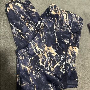 Constantly Varied Gear Black and Gold Marble Capri Leggings